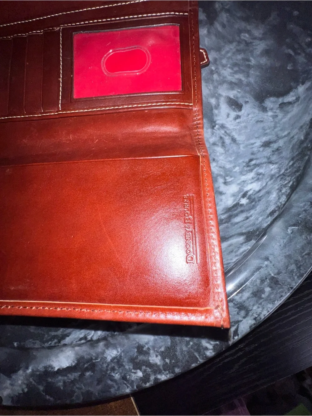 Dooney & Bourke Brown Pebbled Leather Buckle Wallet